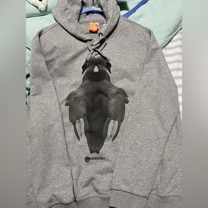 Pre owned dark silver Burberry hoodie original with front goose designs..